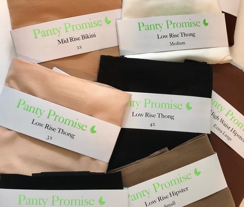 College student folding organic cotton underwear in a dorm room for healthy living