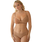 Women in wearing Organic Cotton Low Rise Hipster underwear in color Sand